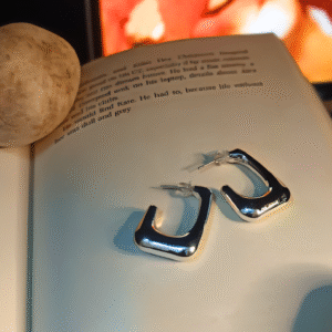 Modern Silver Geometric Hoop Earrings | Chunky angular twist pattern